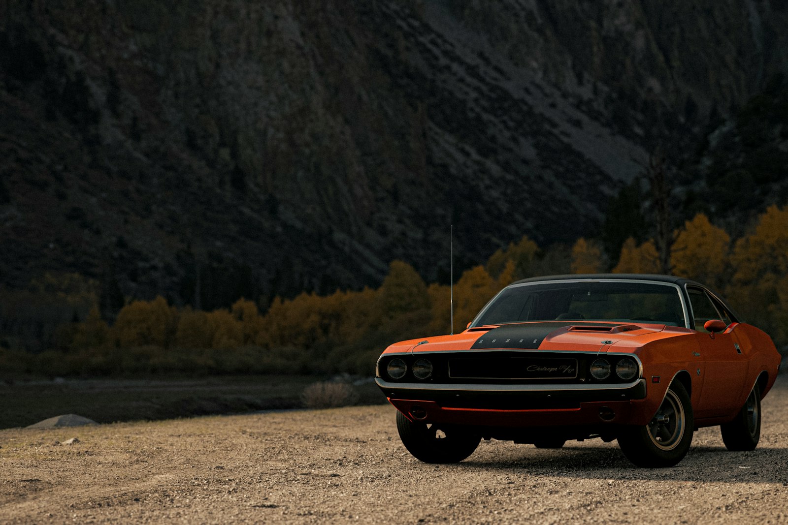 An orange classic American muscle car